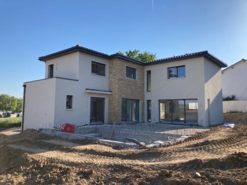 Construction d'une Maison mixte avec parement pierre extérieur