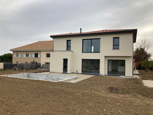 Construction d'une Maison avec toit à pans